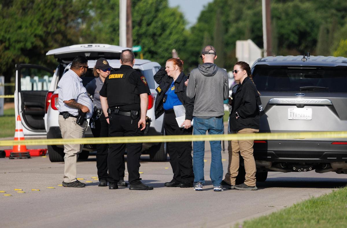 Law enforcement officers investigate a shooting scene on North Crowley Cleburne Road in front of J.A. Hargrave Elementary School, part of Crowley ISD, on Monday, April 14, 2025.