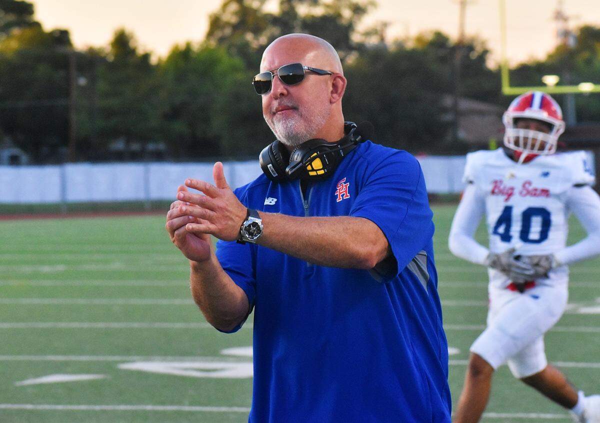 Sam Houston Coach Chris James calls a timeout during the first quarter of a game Thursday night against Irving MacArthur.