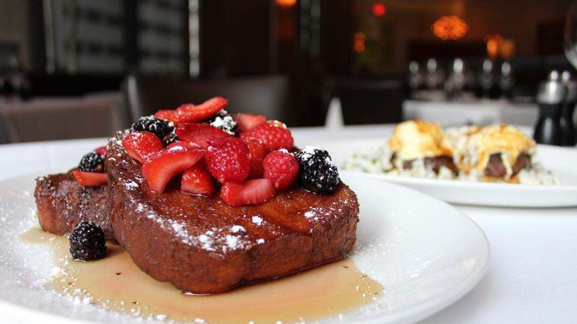 Pain perdu is one of the Easter brunch items at Grace, along with a $49 steak-and-crab Benedict shown in the background
