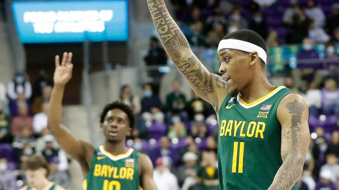 Baylor guards Adam Flagler (10) and James Akinjo (11) signal a three point shot during the first half of a NCAA basketball game at Schollmaier Arena in Fort Worth, Texas, Saturday, Jan. 08, 2022. TCU led by si at the half. (Special to the Star-Telegram Bob Booth)