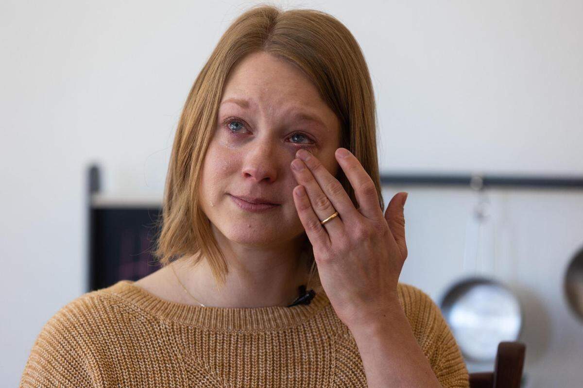 Kara Gardeen cries as she recalls her miscarriage Feb. 18, 2022, in Keller. Gardeen was asked about payment while in the exam room at Texas Health Alliance, before she had seen a doctor.