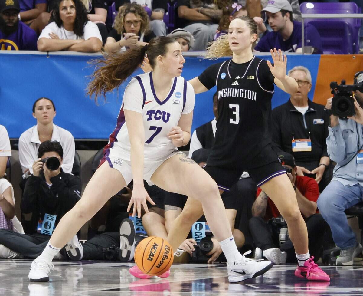 TCU forward Marta Suarez (7) drives against Washington guard Devin Coppinger (3) during the second half of a second round NCAA Division I Women's Basketball Championship game at Schollmeier Arena in Fort Worth, Texas, Sunday, March, 22, 2026.