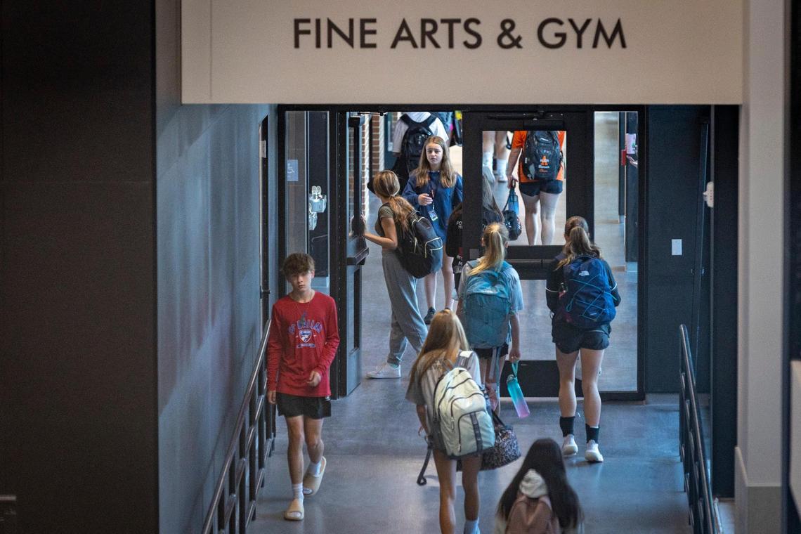 Students flood the hallway before classes begin at McAnally Middle School on Thursday, Oct. 6, 2022, in Aledo. The Aledo Independent School District finished building the second middle school this year to support its growing student population.