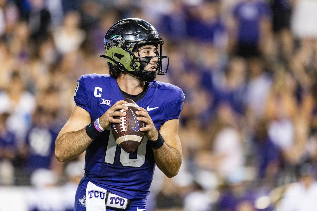 TCU quarterback Josh Hoover (10) prepares to throw a pass late in the first half of an NCAA football game at Amon G. Carter Stadium in Fort Worth on Friday, Oct. 4, 2024.