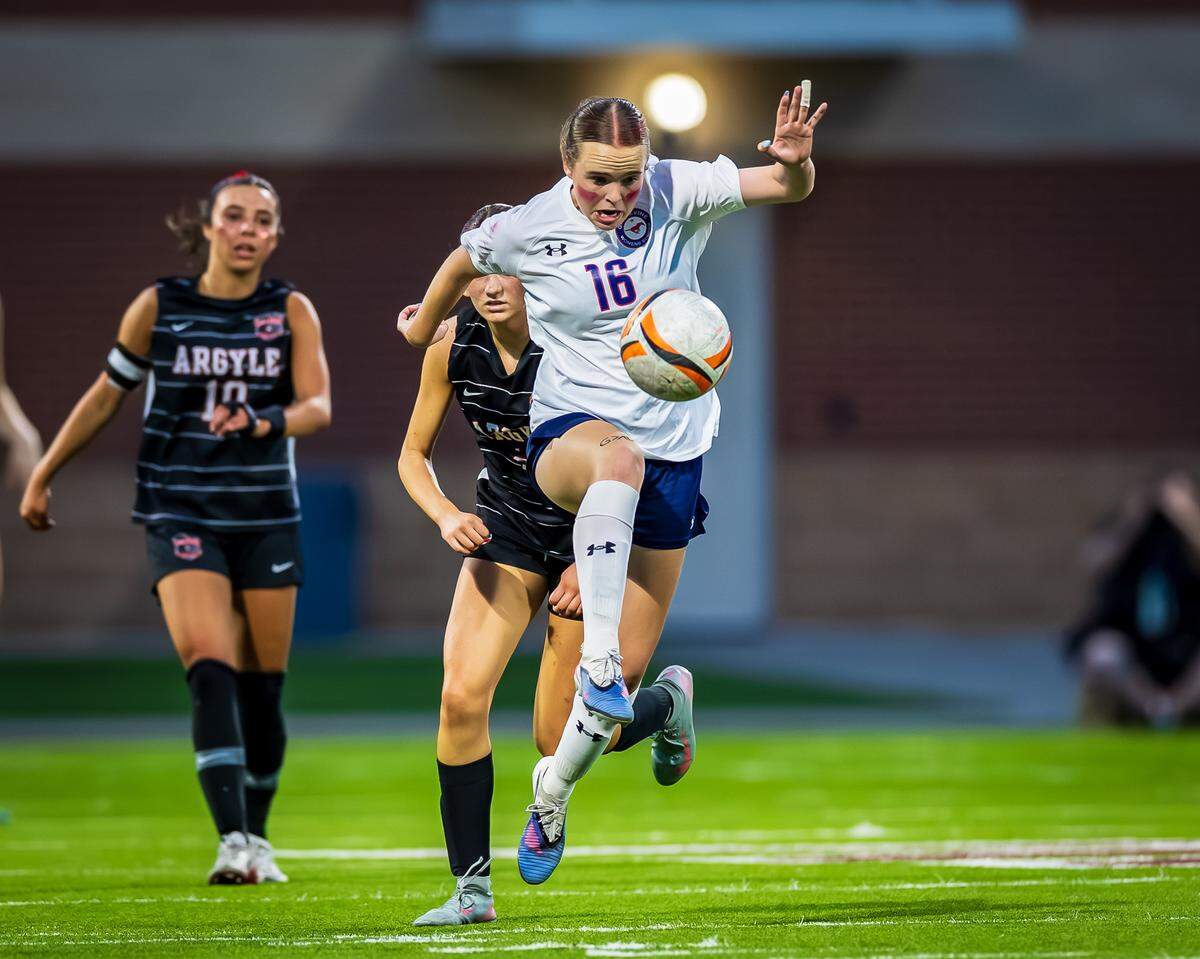 Grapevine’s Ella Wilson (16) advances the ball down the pitch against Argyle in the Class 5A Division 2 Region 1 Final soccer match on Tuesday, March 31, 2026, at Northwest ISD Stadium in Justin, Texas.