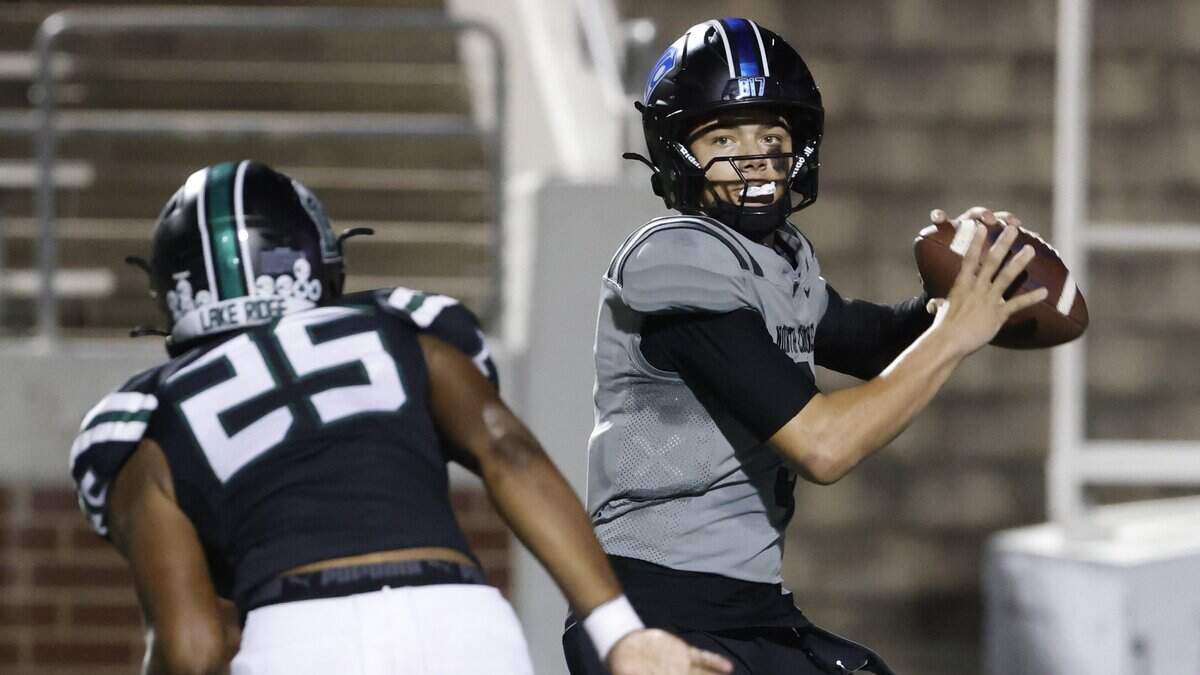 North Crowley quarterback Hayes Cloutier (9) tosses to the outside during the first half of a UIL football game between North Crowley and Lake Ridge at Vernon Newsom Stadium in Mansfield, Texas, Thursday, October 09, 2025.