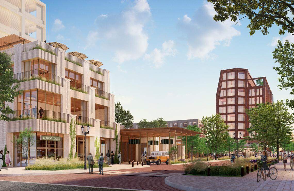 A rendering of Westside Village shows an overview of the development, with a mass timber mixed-use building on the left and a tall windowed building on the right.