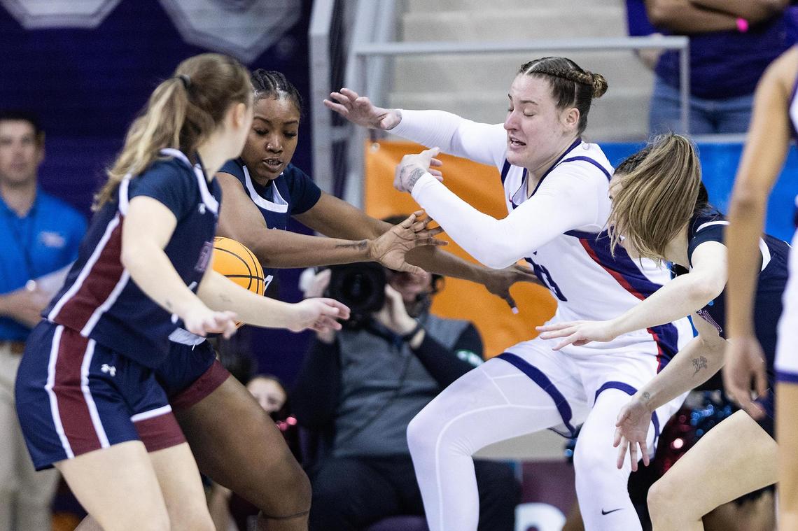 TCU center Sedona Prince (13) loses the ball while being double teamed in the first half of the first round of the Women’s NCAA Championships Tournament game between TCU and Fairleigh Dickinson at Schollmaier Arena in Fort Worth on Friday, March 21, 2025.