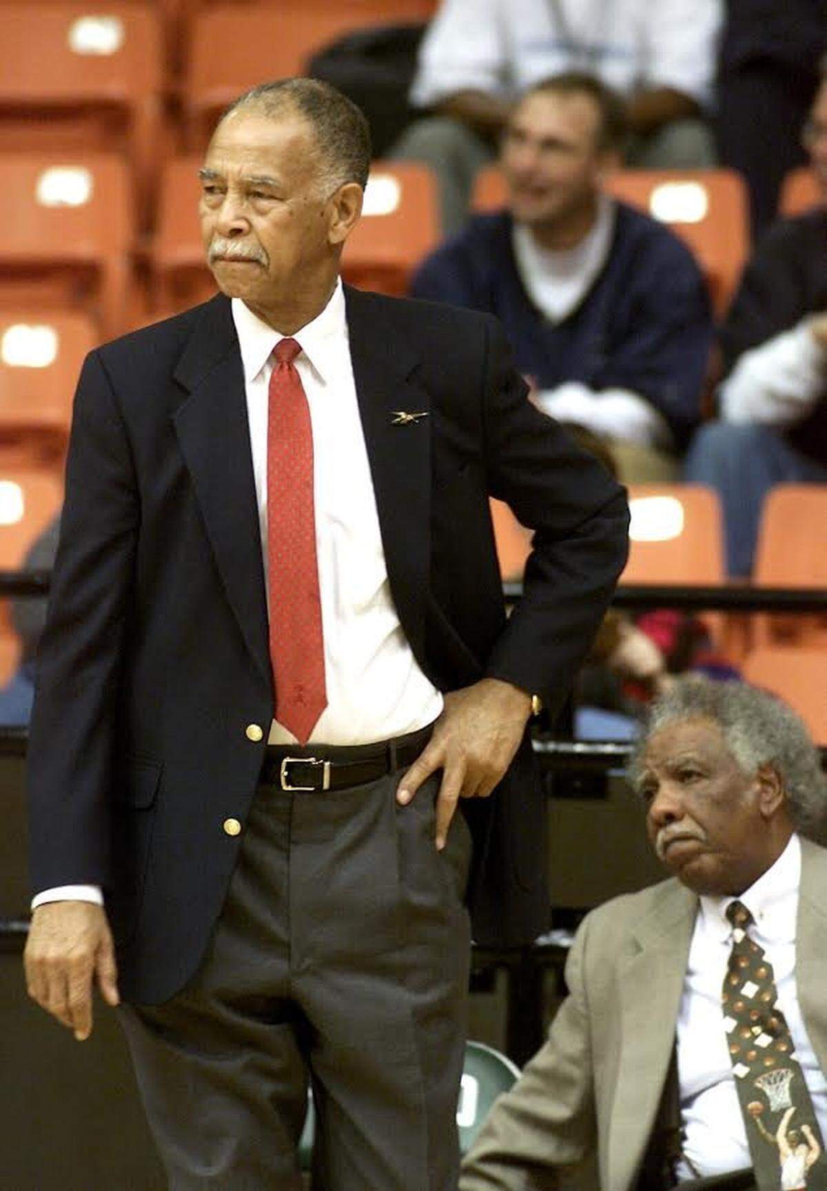 Basketball Hall of Fame inductee Robert Hughes (L) coached the Dunbar boys’ basketball team from 1974 to 2005. He had one assistant during his entire time at Dunbar, Leondas Rambo (R). Coach Rambo died on Tuesday.