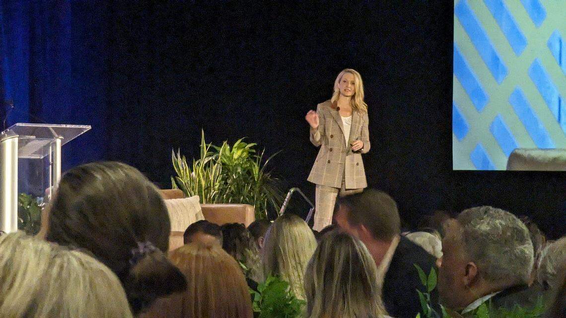 Fort Worth Mayor Mattie Parker talking on a stage with people's heads in the foreground
