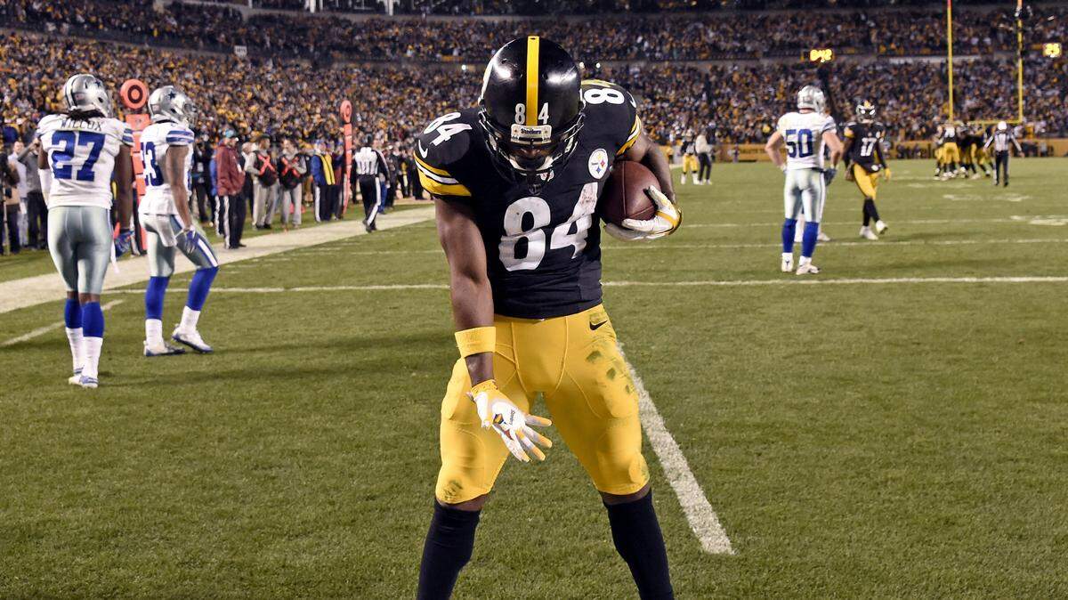 FILE - In this Nov. 13, 2016, file photo, Pittsburgh Steelers wide receiver Antonio Brown (84) celebrates scoring a touchdown during an NFL football game against the Dallas Cowboys in Pittsburgh. Freed by NFL officials to let loose in the end zone, Brown hopes to strut his stuff in Sunday’s opener in Cleveland.