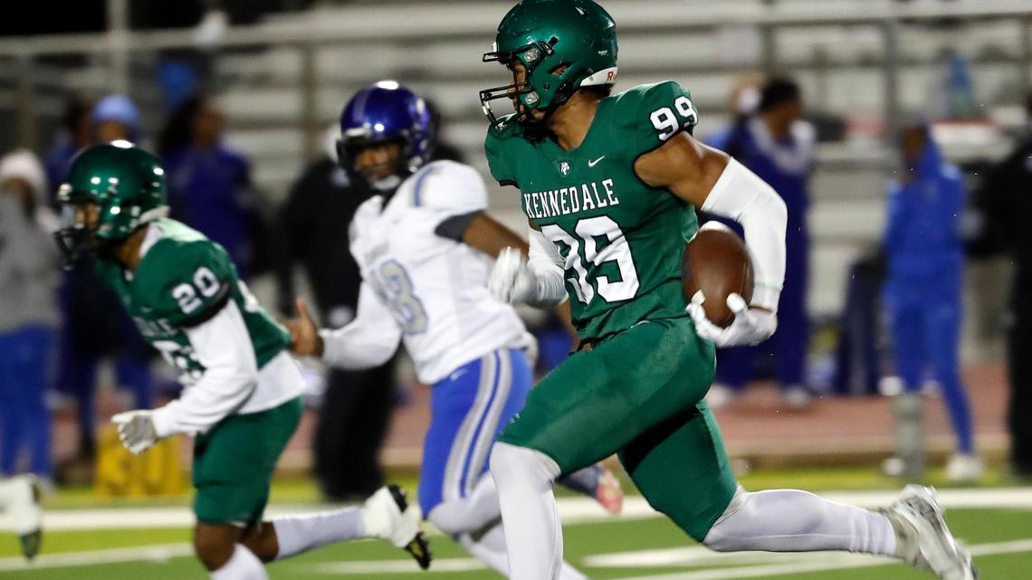 Kennedale’s Poasa Utu (99) returns a kickoff to put the Wildcats up 16-0 in the first half of a District 6-4A D1 high school football game at Wildcat Stadium in Kennedale, Texas, Friday, Nov. 04, 2022. Kennedale led Dunbar 50-0 at the half. (Special to the Star-Telegram Bob Booth)