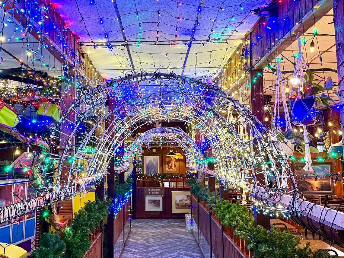 A arch of holiday lights greets customers returning to Campo Verde, now a general bar-and-grill in a location long known as a “Christmas wonderland” Mexican restaurant.