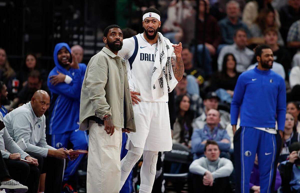 SALT LAKE CITY, UT - JANUARY 08: Anthony Davis #3 of the Dallas Mavericks talks with injured teammate Kyrie Irving #11 during the second half of their game against the Utah Jazz at the Delta Center on January 8, 2026 in Salt Lake City, Utah. NOTE TO USER: User expressly acknowledges and agrees that, by downloading and or using this photograph, User is consenting to the terms and conditions of the Getty Images License Agreement.(Photo by Chris Gardner/Getty Images)