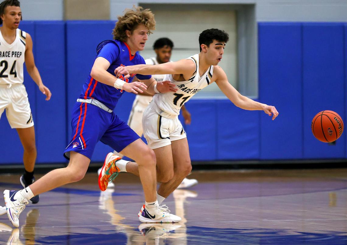 Arlington Grace Prep guard Auri Bidgoli (11) goes for a loose ball against Colleyville Covenant guard Caleb Bunch (L) during the first half of a TAPPS 4A Regional Round Boys Basketball playoff game played on March 6, 2021 at Brewer High School in Fort Worth TX. (Steve Nurenberg Special to the Star-Telegram)