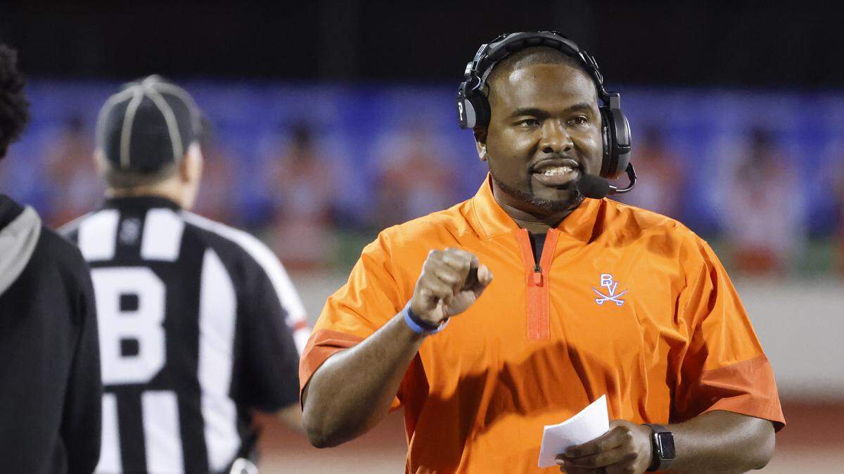 Bowie head coach Joseph Sam walks the side lines during the first half of a UIL football game between South Grand Prairie and Arlington Bowie at UTA Maverick Stadium in Arlington, Texas, Thursday Nov. 06, 2025.