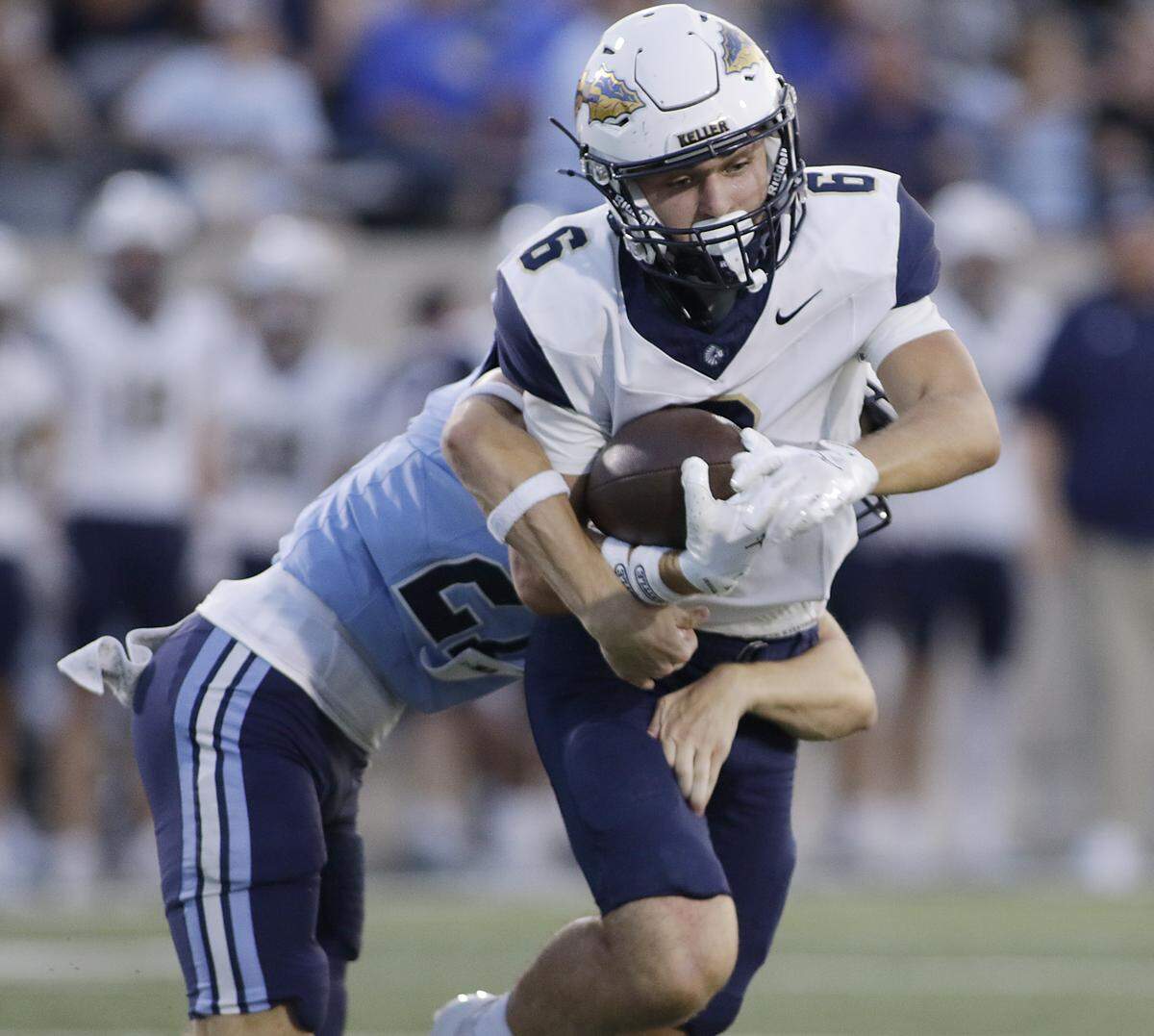 Keller’s Brock Meek is brought down by the  L.D. Bell defense during their game at Pennington Field on Friday, Sept. 19, 2025 
