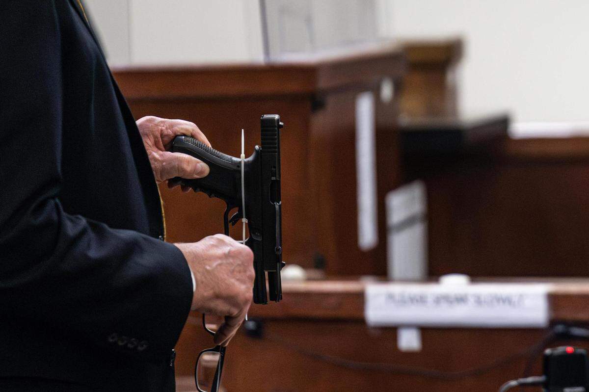 Tarrant County Assistant Criminal District Attorney Robert Huseman questions Rickey Edwards about the gun he used to kill his wife and stepson. Edwards represented himself at his capital murder trial in Criminal District Court No. 2 at the Tim Curry Criminal Justice Center in Fort Worth on Friday, Oct. 6, 2023. Edwards was found guilty Monday of shooting to death Portia Williams-Edwards and Kameion Kitchen on May 3, 2020, in Grand Prairie.