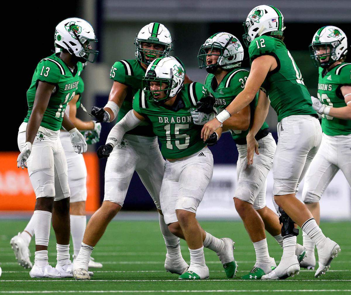 Southlake Carroll linebacker Allan Kleiman (15) celebrates with his teammates after coming up with an interception against Highland Park during the third quarter, Thursday night, August 26, 2021 played at AT&T Stadium in Arlington, TX. (Steve Nurenberg Special to the Star-Telegram)