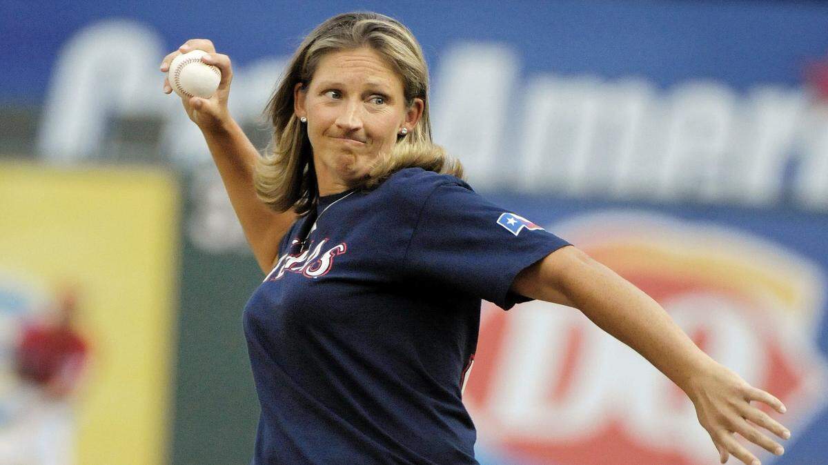 TCU alumnus and pro golfer Angela Stanford threw out the first pitch before a Rangers' game at Globe Life Park in 2011.