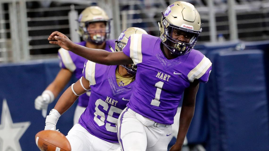 Mart running back Klyderion Campbell (1) drops the ball in the end zone after scoring during the third quarter of a 2A division II State Championship football game at AT&T in Arlington, Texas, Thursday, Dec. 19, 2019. Mart defeated Hamlin 25-20. (Special to the Star-Telegram Bob Booth)