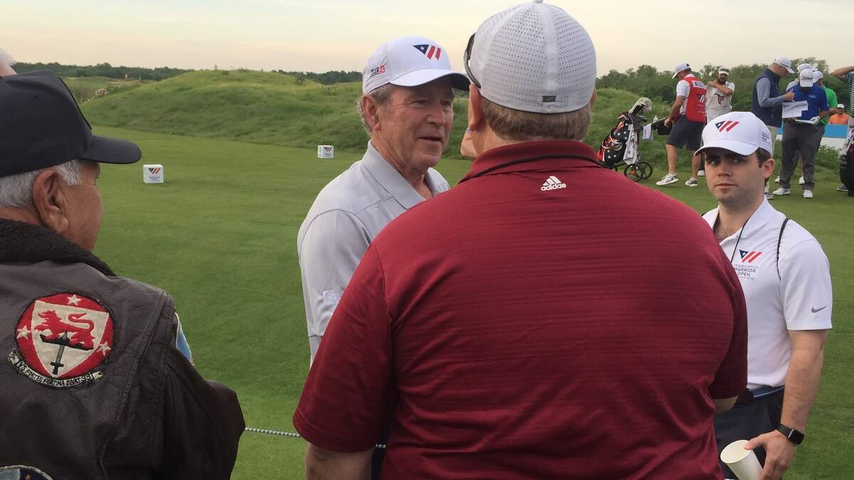 Former President George W. Bush hosted the “Warrior Open” on Monday at Trinity Forest Golf Club.