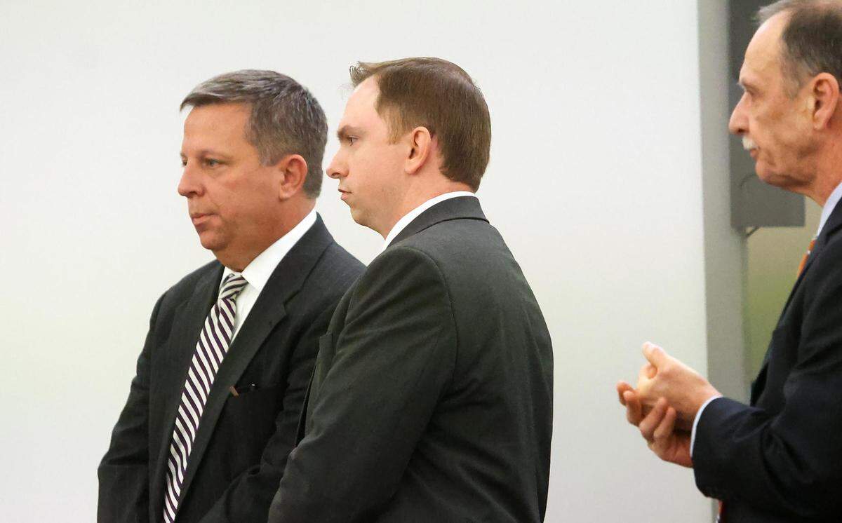 Aaron Dean, center, stands with his defense team after the jury delivered their verdict on Thursday, December 15, 2022, at the Tim Curry Criminal Justice Center in Fort Worth. Dean, a former Fort Worth police officer, was found guilty of manslaughter in the fatal shooting of Atatiana Jefferson in 2019.