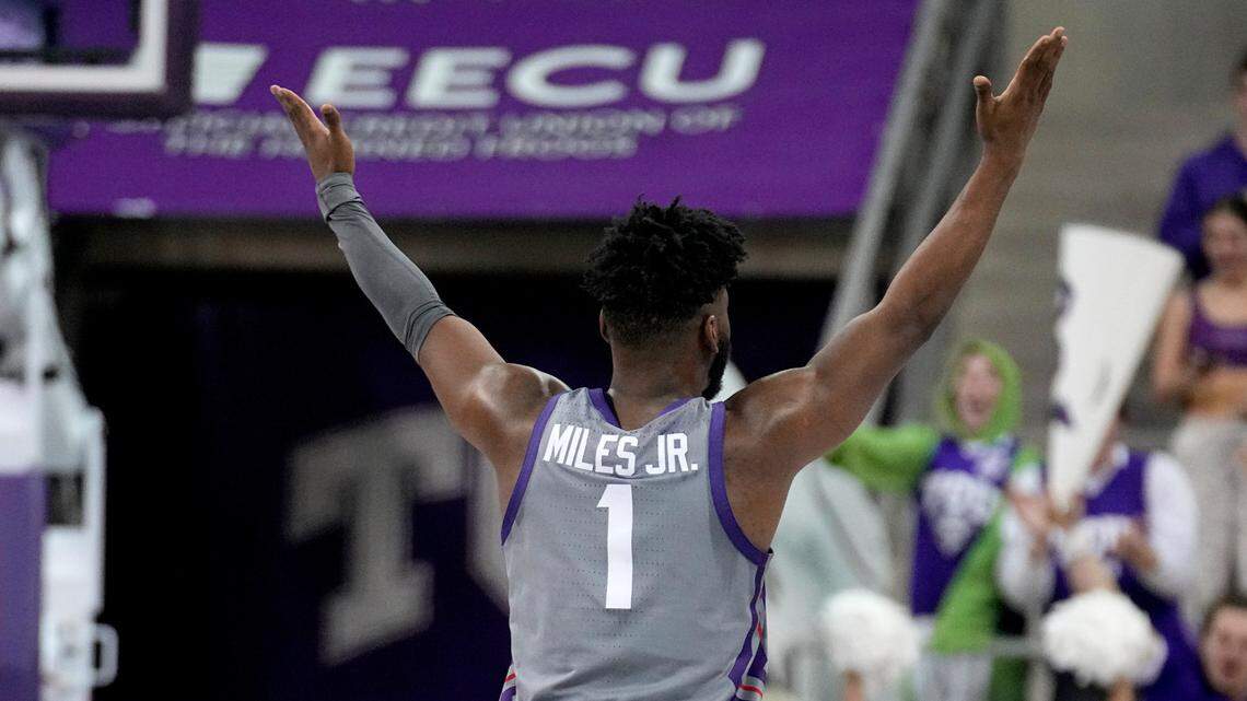 TCU guard Mike Miles Jr. (1) celebrates after sinking a basket in the second half of an NCAA college basketball game against Oklahoma State on Saturday.