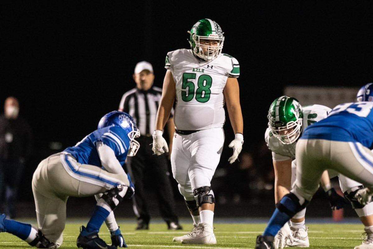 Azle lineman Jack Schwantz lines up during a game in 2020. Schwantz died in a single-engine plane crash on Saturday, Aug. 21, 2021. He was 18.