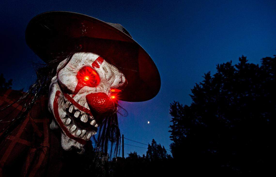The moon and stars were a fitting backdrop for the fearsome figures along the many paths in Chris Caughlan’s property in Granbury.