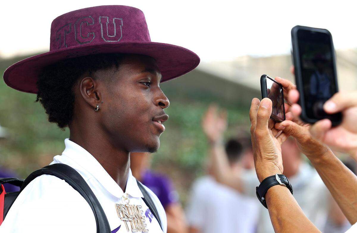 TCU outfielder Austin Davis media and fans before getting before leaving Fort Worth for Omaha, Neb., and the College World Series on Wednesday, June 14, 2023. TCU’s first opponent will be Oral Roberts University.