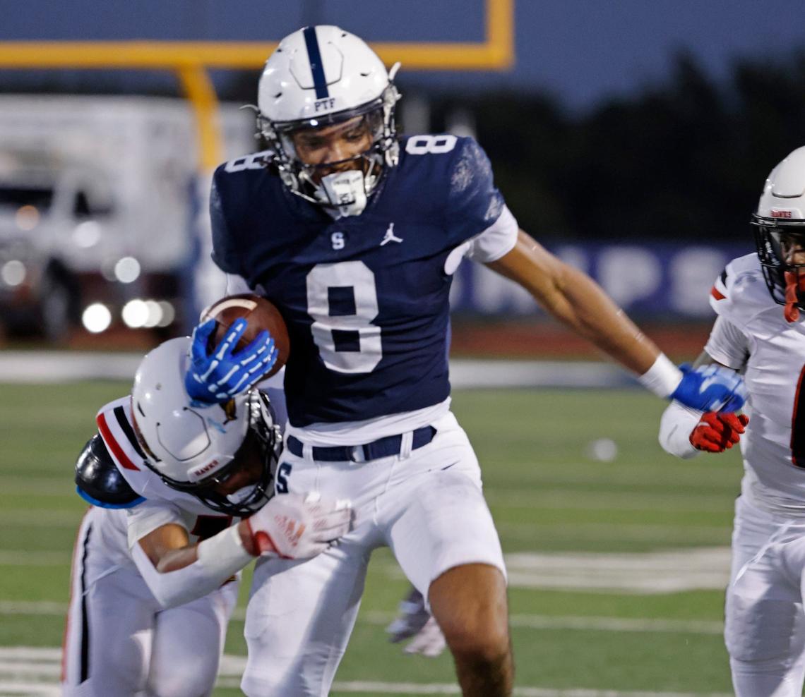 All Saints wide receiver Qumonte Williams (8) gains yards up the middle at All Saints High School’s McNair Stadium in Fort Worth Thursday, Sept. 12, 2024.