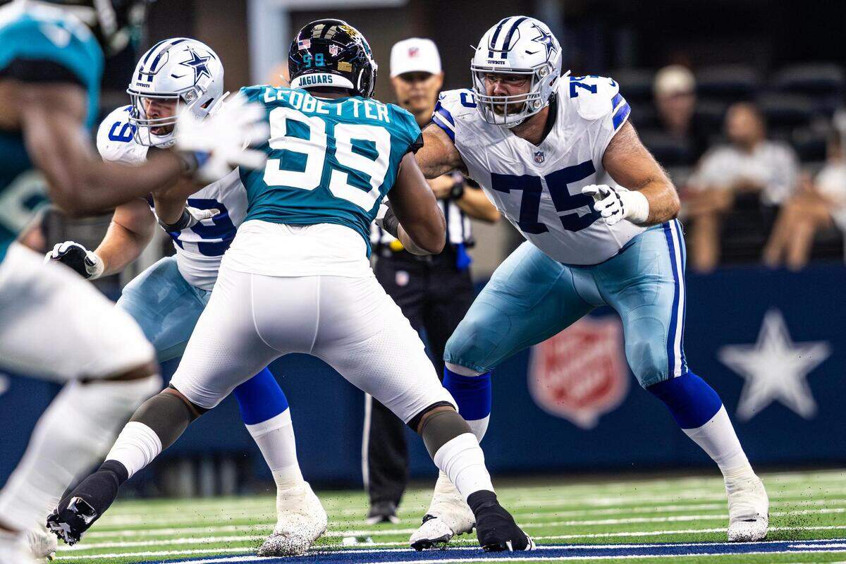 Dallas Cowboys offensive lineman Josh Ball (75) blocks Jacksonville Jaguars defensive lineman Jeremiah Ledbetter (99) in the second quarter at AT&T Stadium in Arlington, Texas on Saturday, Aug. 12, 2023.