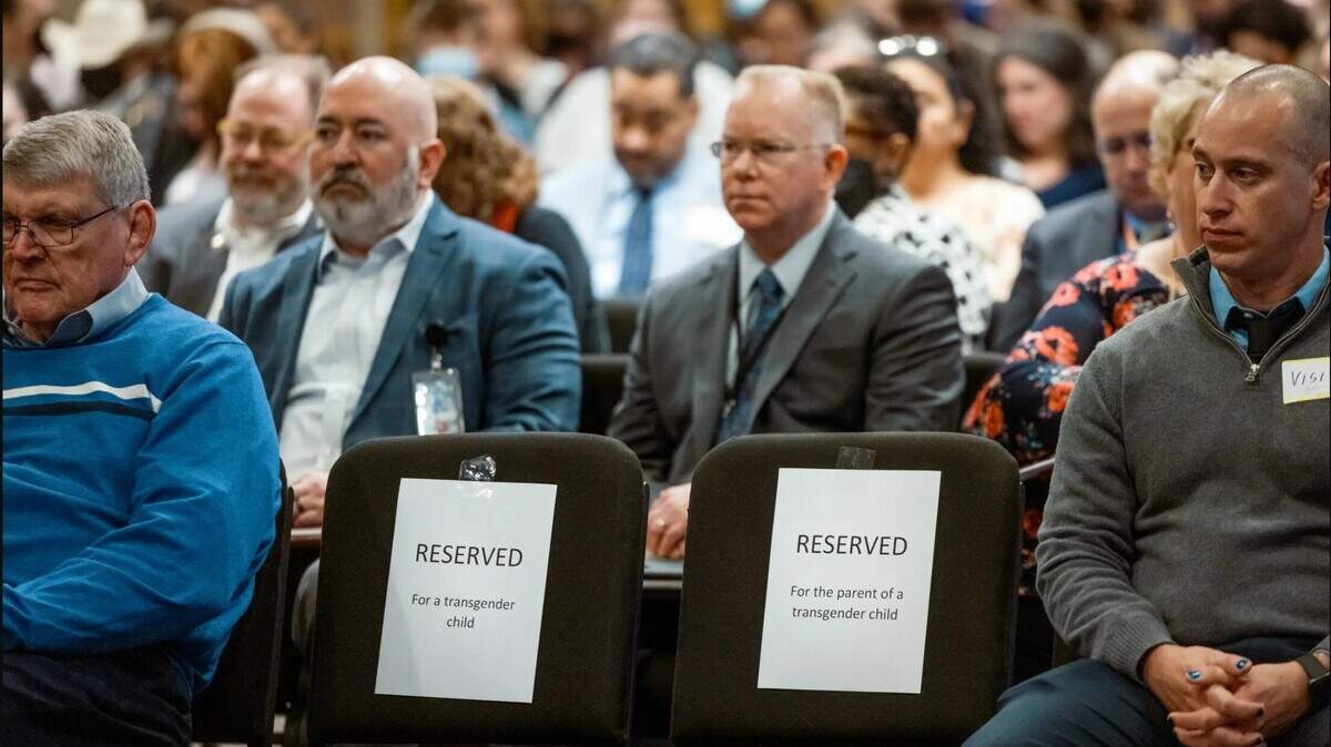 Seats reserved for transgender children and their parents sit empty at a Texas Department of Family and Protective Services committee meeting as most were too afraid to testify publicly.