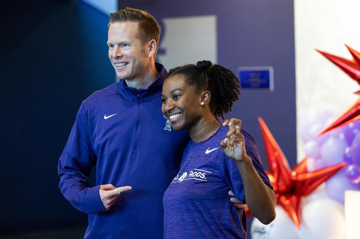 TCU Women’s Basketball Head Coach Mark Campbell takes a photo with former player Zahna Murillo prior to the NCAA March Madness Selection Watch Party at the Schollmaier Arena in Fort Worth on Sunday, March 16, 2025. The Horned Frogs were awarded the 2nd seed and will face the 15 seeded Fairleigh Dickinson Knights.