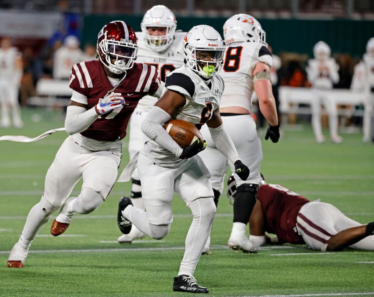 Aledo running back Raycine Guillory (9) heads for the end zone in the first half of a Conference 5A Division 1 UIL Regional football playoff game at Choctaw Stadium in Arlington, Texas, Friday, Oct. 24, 2023.