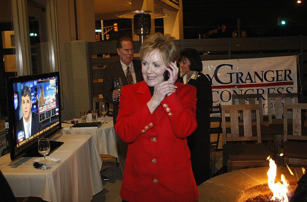 March 2, 2010: Rep. Kay Granger talks on the phone with a supporter as she watches the returns for the Republican primary election at Winslow’s Wine Cafe in Fort Worth.