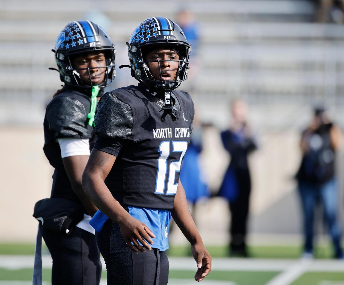 North Crowley quarterback Chris Jimerson (12) checks the sidelines for the play during a UIL Class 6A D1 Bi-district playoff football game at Crowley ISD Multi-Purpose Stadium in Fort Worth, Texas, Saturday, Nov. 16, 2024.