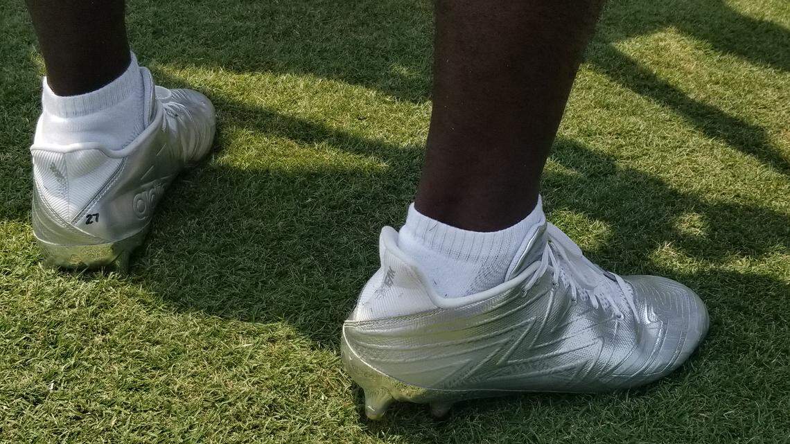 Cowboys’ cornerback Jourdan Lewis was showing off some Adidas cleats during Saturday morning’s walk through at training camp. Lewis had the cleats customized with a metallic look all around and on the sole.