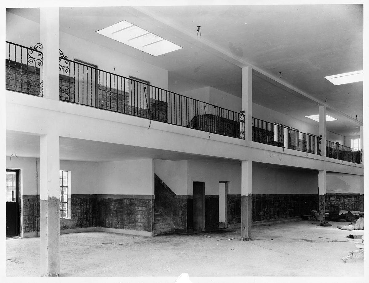 May 25, 1930: The Fort Worth Public Market under construction on Henderson Street, with wrought iron balconies along a second level.