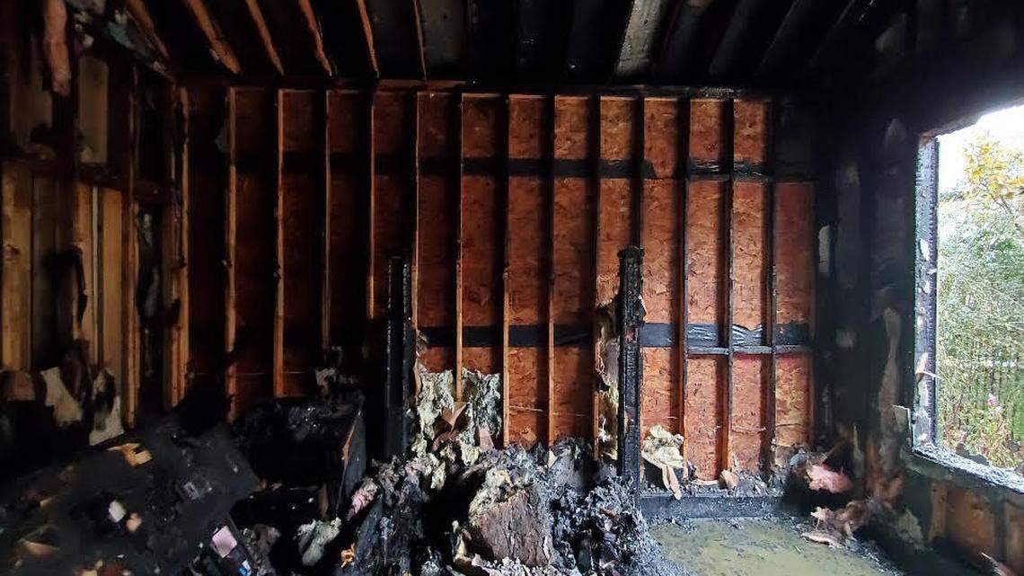 Firefighters rescued a woman stranded on the roof of her burning McKinney home. 