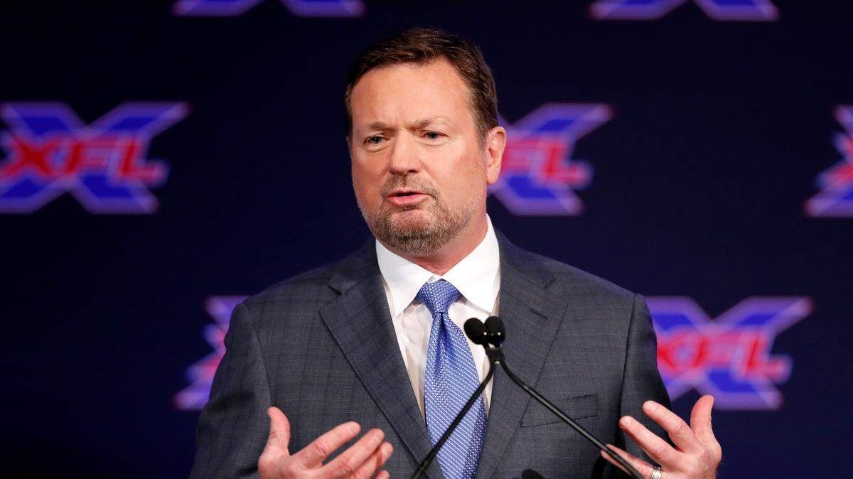 Bob Stoops coaches the Arlington Renegades. The XFL and the Renegades kick off their season on Saturday.