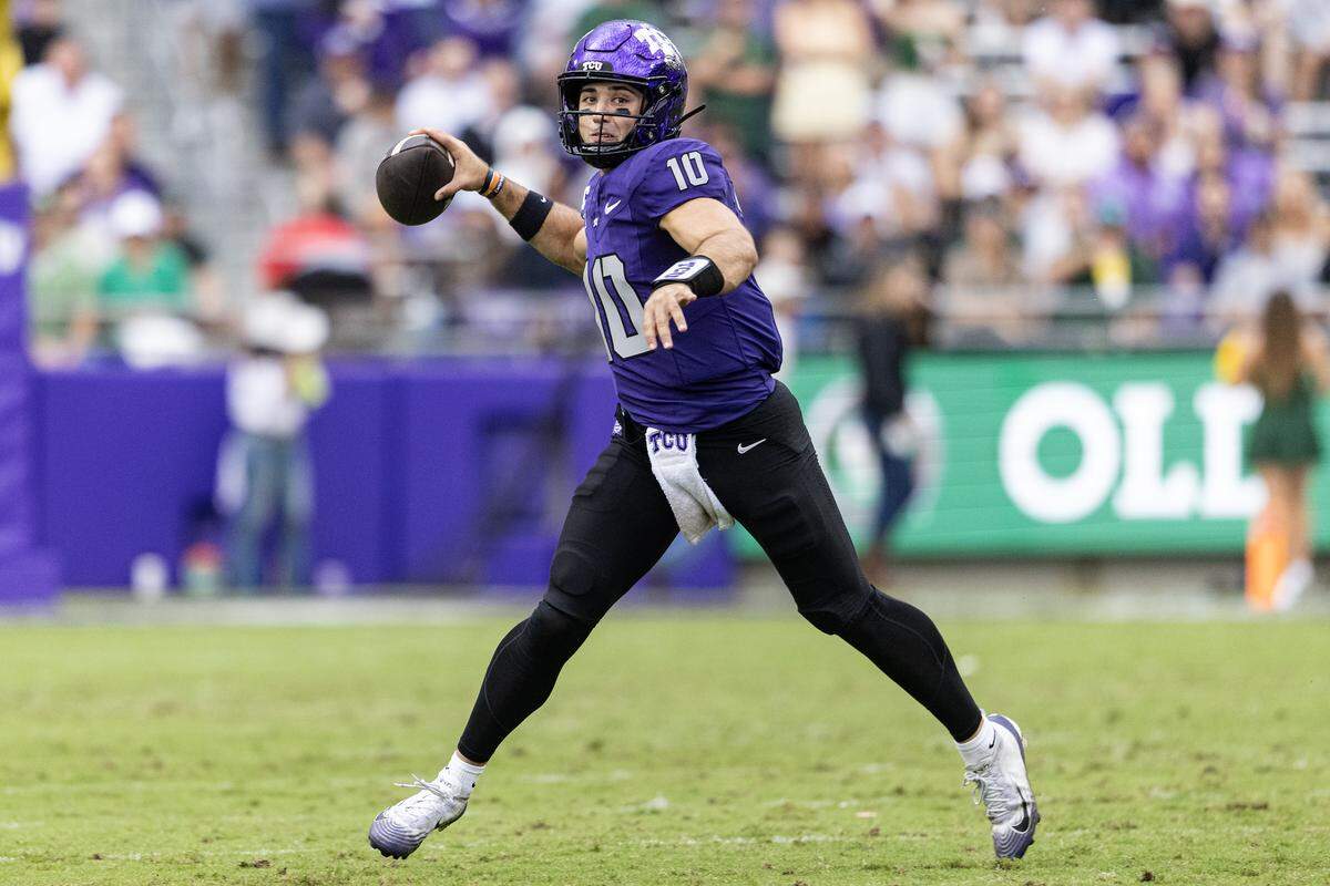 TCU quarterback Josh Hoover (10) throws a pass in the first half Saturday. He completed 22 of 31 passes for 231 yards and three touchdowns in the 42-36 victory.