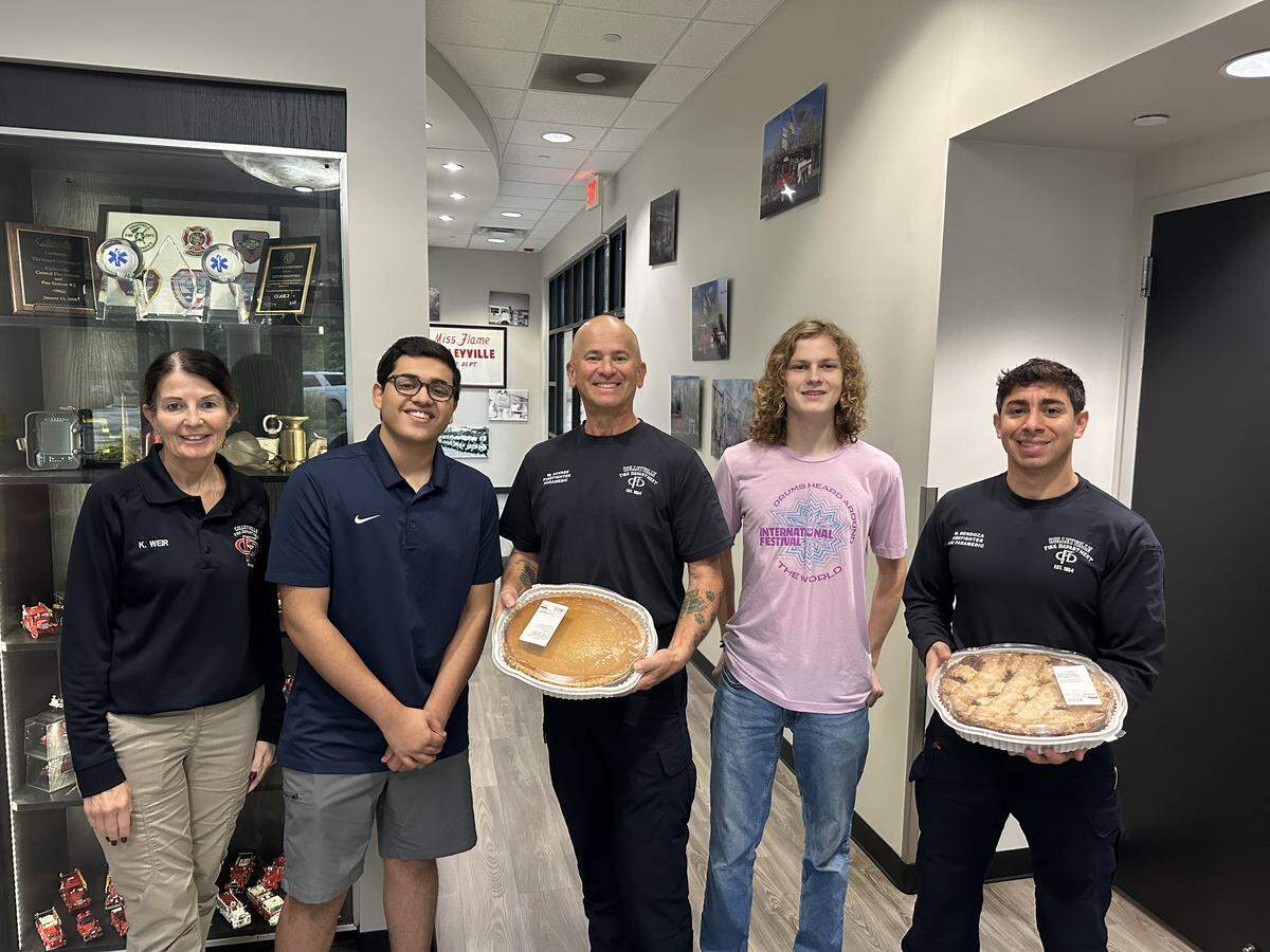 Daniel Thomas (second from left) and a group of friends delivered pies to North Texas first responders for Thanksgiving. The teen said he got the idea after serving as Colleyville’s “Mayor for a Day” and seeing how much work police officers and firefighters do to keep their communities safe.