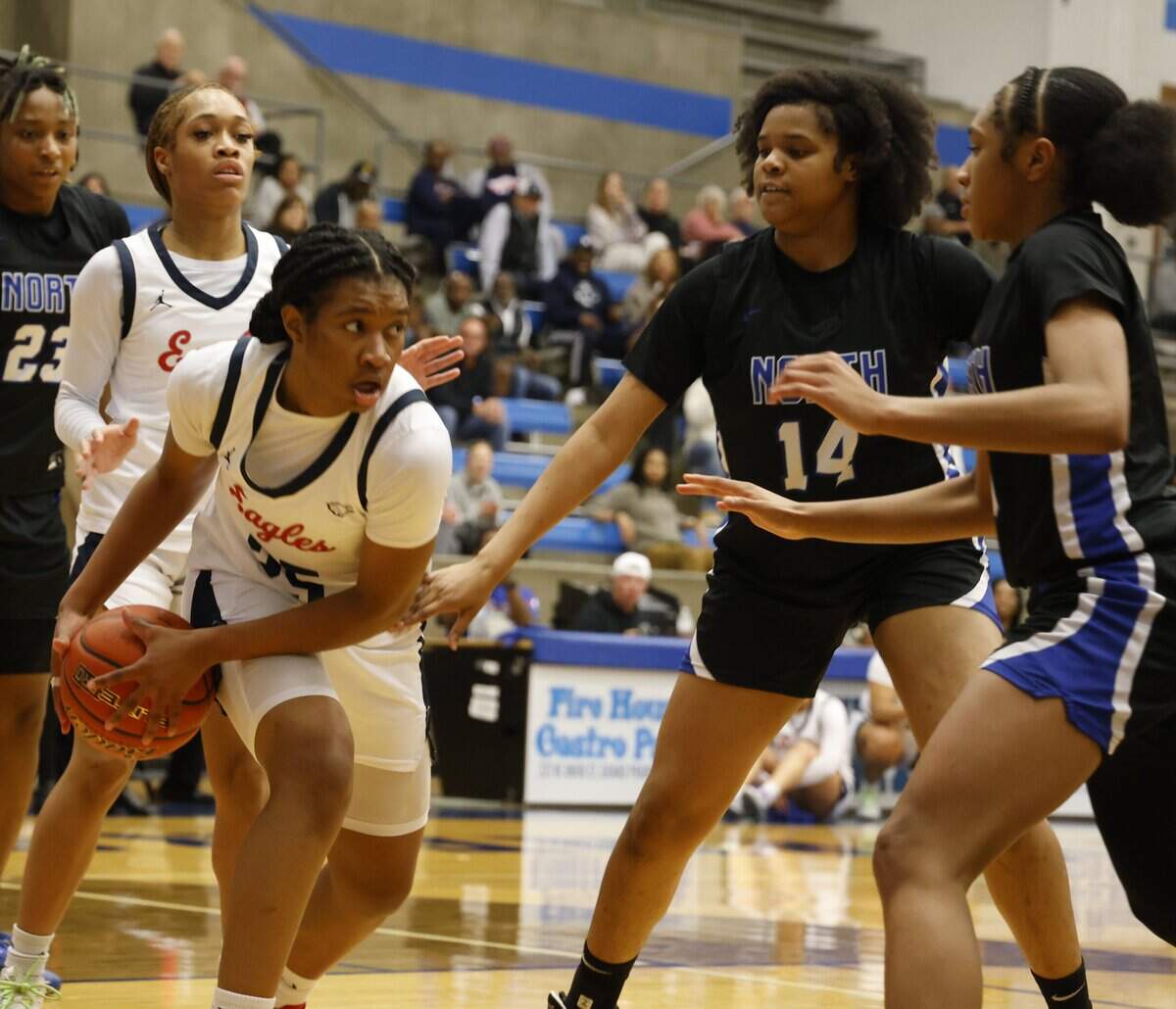 Allen guard Khy Johnson (25) grabs a defensive rebound against North Crowley during the first half of a UIL Class 6A Division I girls regional semifinals basketball playoff game at Grand Prairie High School in Grand Prairie, Texas, Tuesday Feb. 24, 2026.