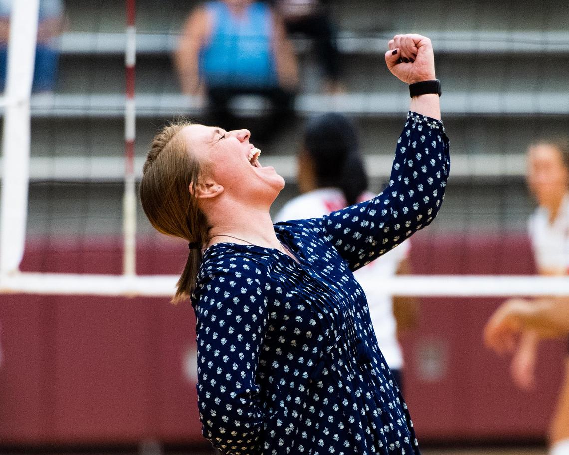Southlake Carroll head coach Teresa Dunn celebrates after a deciding point is one against Marcus on 11/5/19.