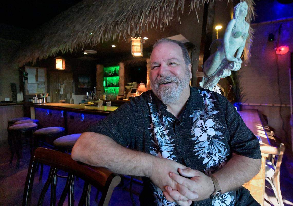 J.P. Hunter sits inside his 4 Kahunas Tiki Lounge in downtown Arlington.