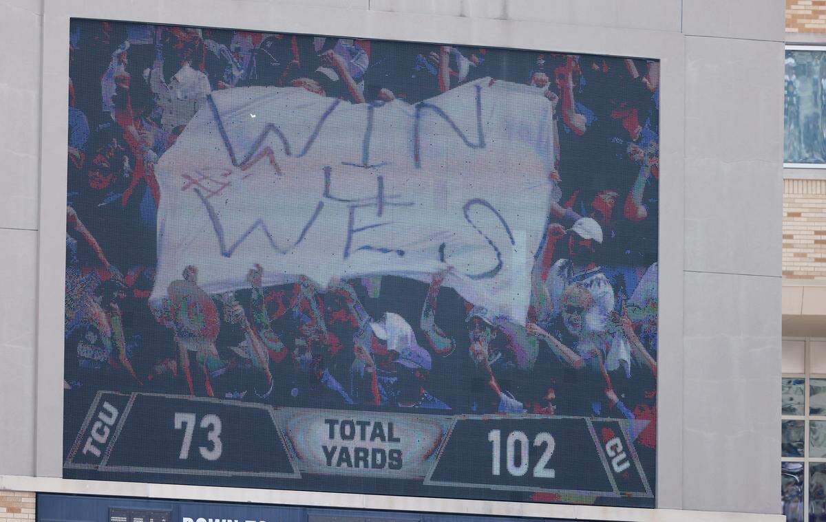 The Jumbotron at Amon G. Carter Stadium shows TCU fans flying a banner in support of Wes Smith, a TCU student who was killed in a shooting on Friday, during the team’s season opener against Colorado on Saturday, September 2, 2023. 