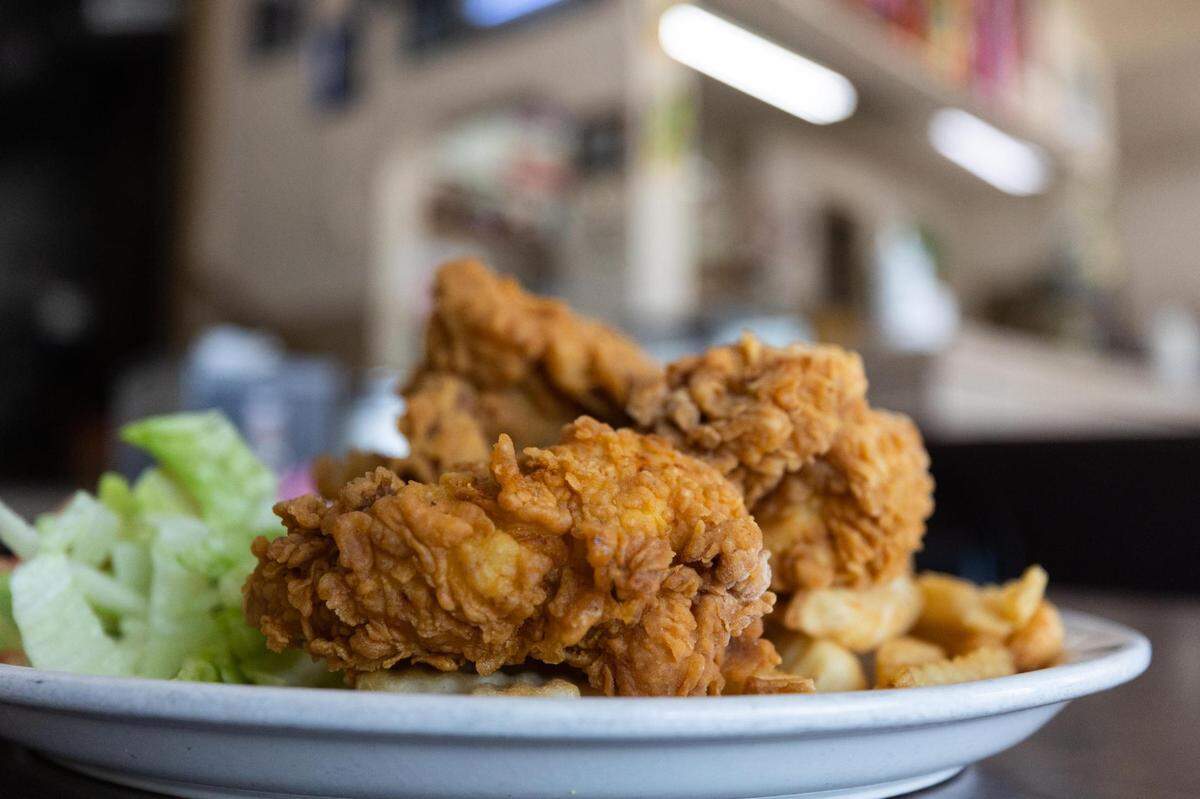 A fried chicken plate at Jesus Family Restaurant on Main Street in Fort Worth.