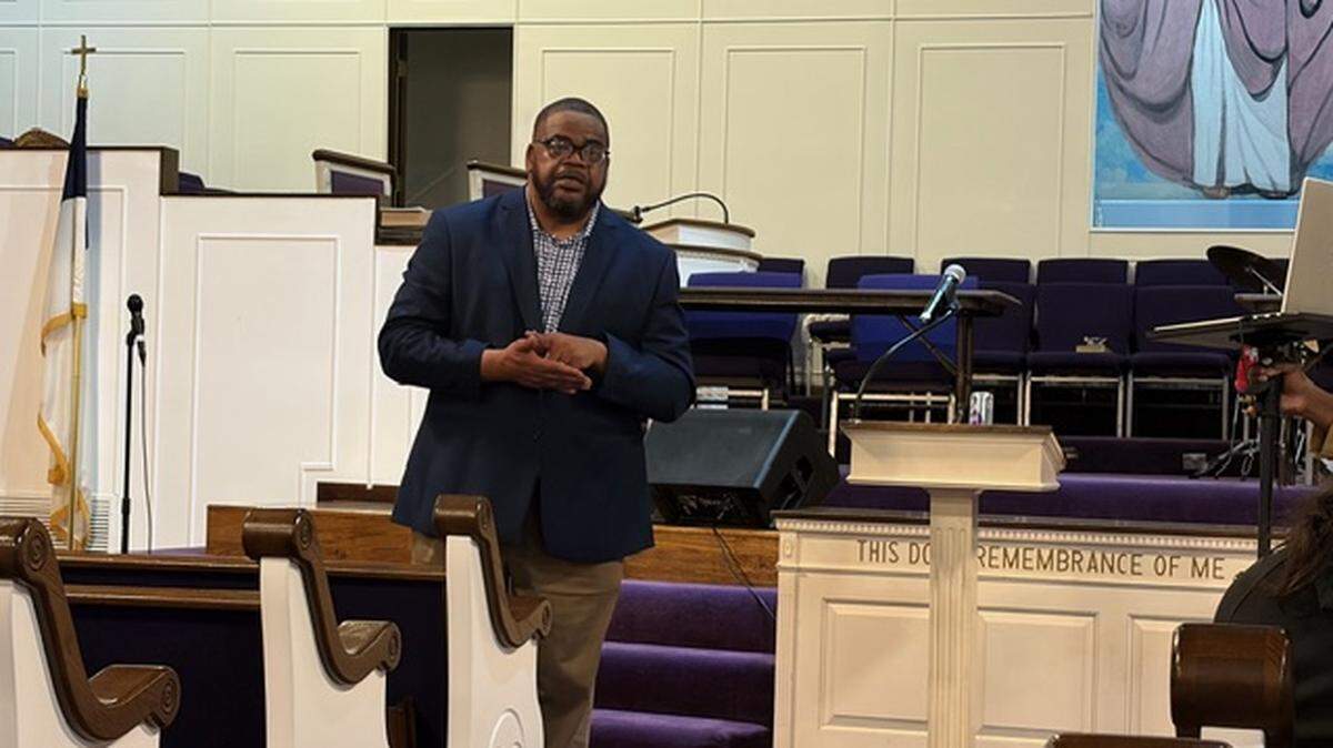 Pastor Kyev Tatum speaks during a town hall meeting at New Mount Rose Missionary Baptist Church on Thursday, Oct 30, 2025. He spoke about a confrontation he had with a police officer in which Tatum said the officer used a racial slur toward him.